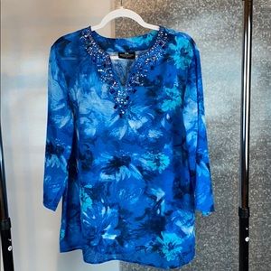 Tropical patterned blue blouse